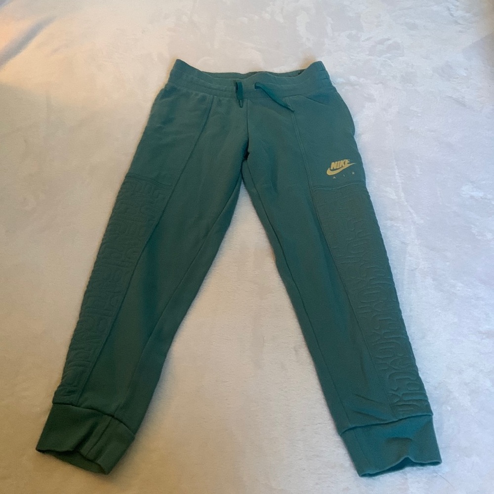 Teal Nike joggers